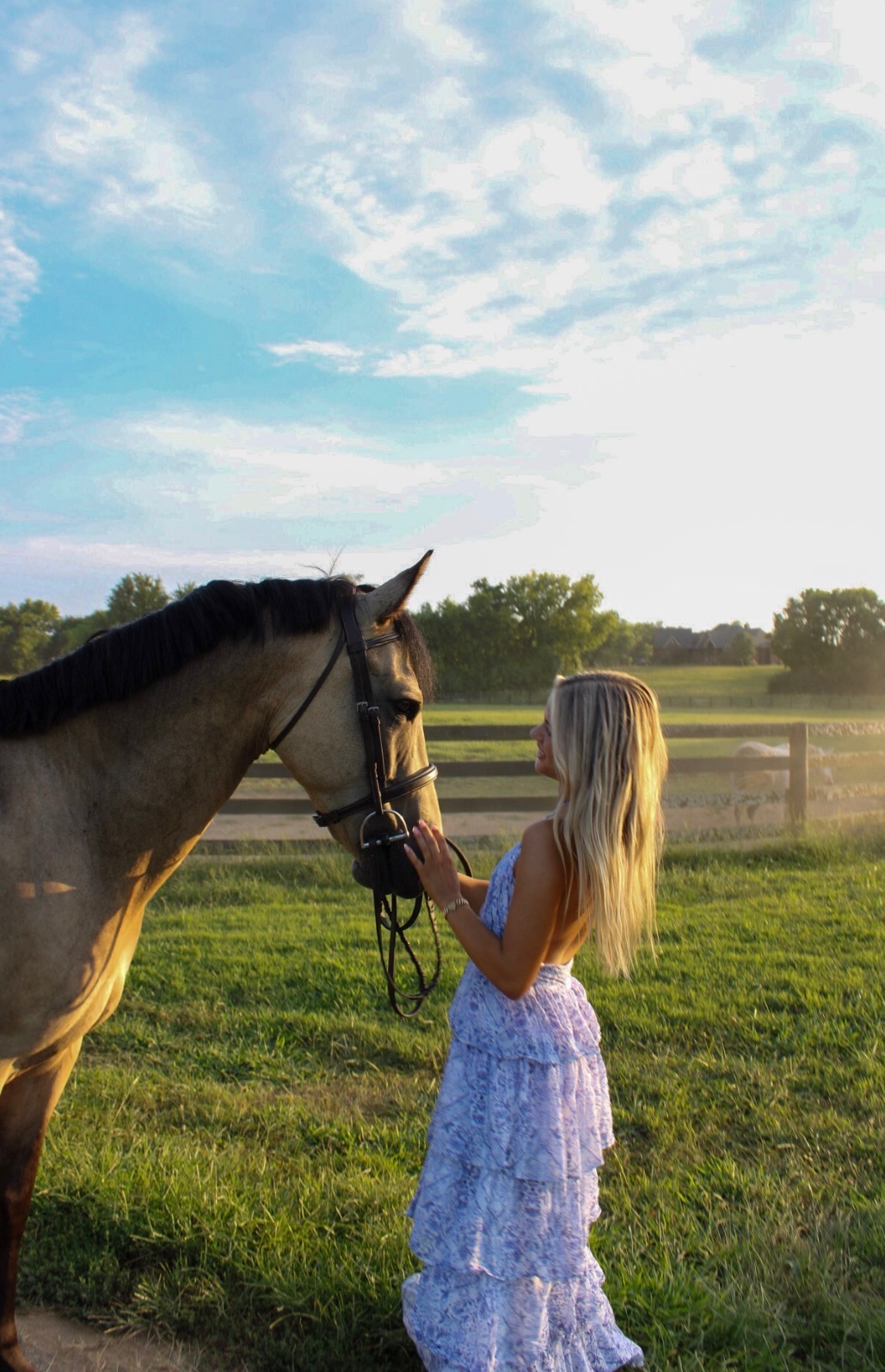 Girl greeting her horse in a Tennessee pasture
